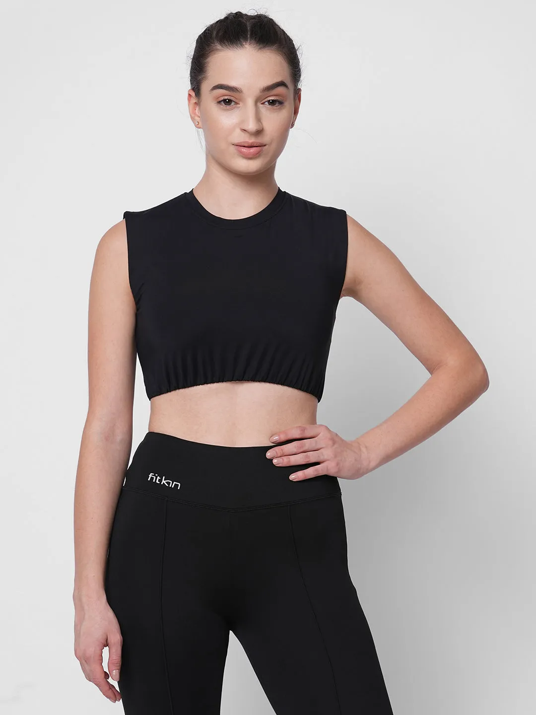 Fitkin women black solid short sleeve crop top with back design