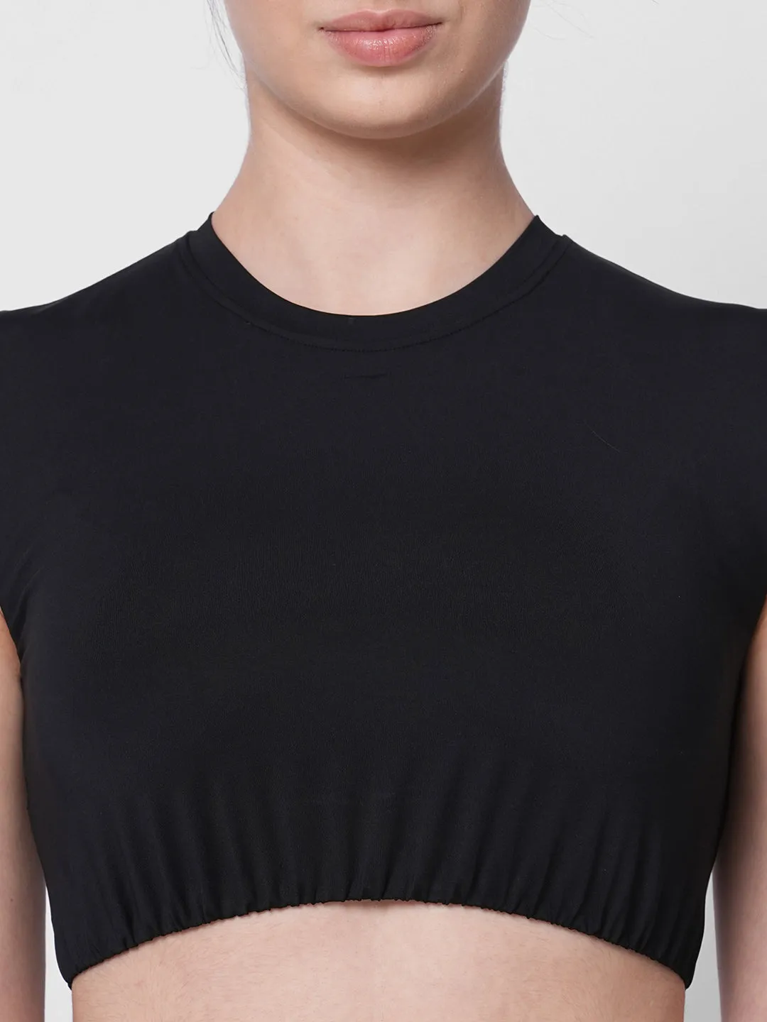 Fitkin women black solid short sleeve crop top with back design