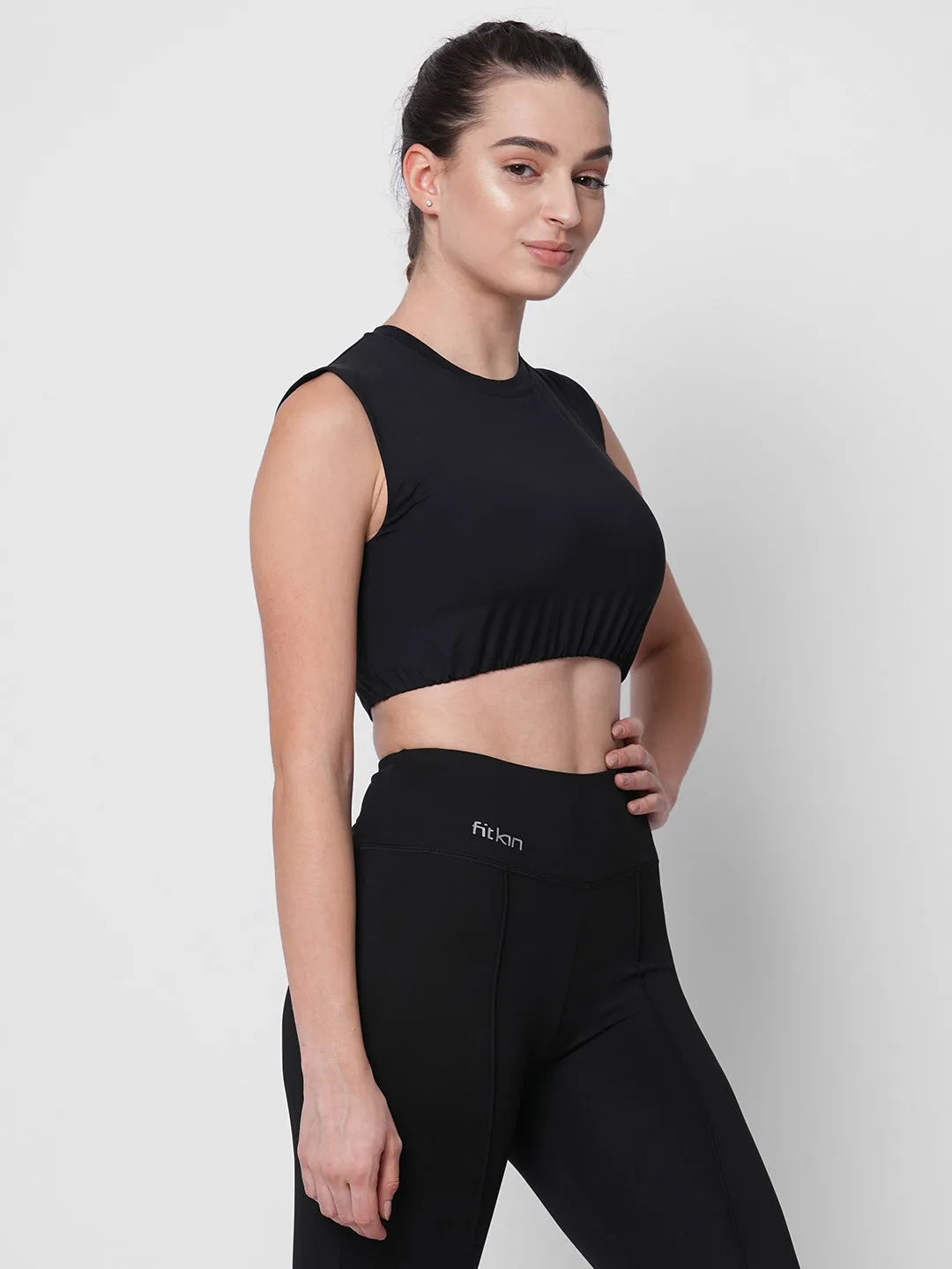 Fitkin women black solid short sleeve crop top with back design