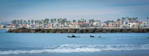 Waves and Wonders: Surfers and Cityscape of Newport Beach
